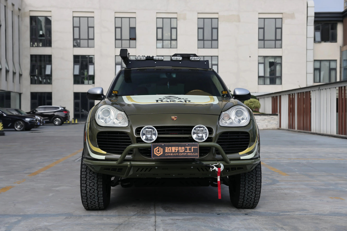 Porsche Cayenne 955 off-road front bumper (2002–2007) — trail action shot on lifted Cayenne