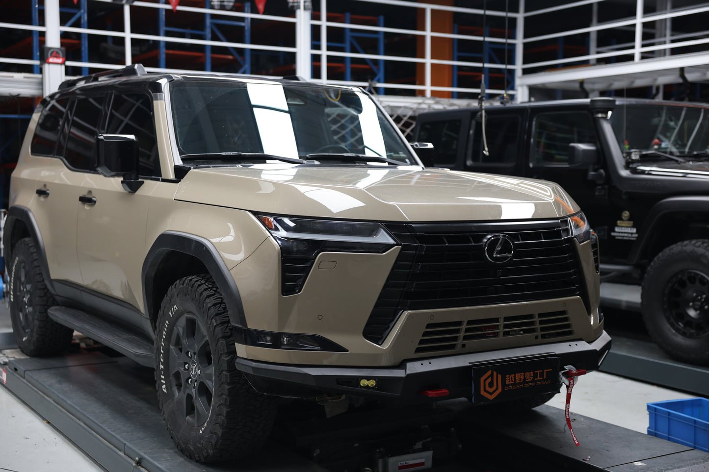 Lexus GX550 off-road front bumper — close-up of recovery point and light mount