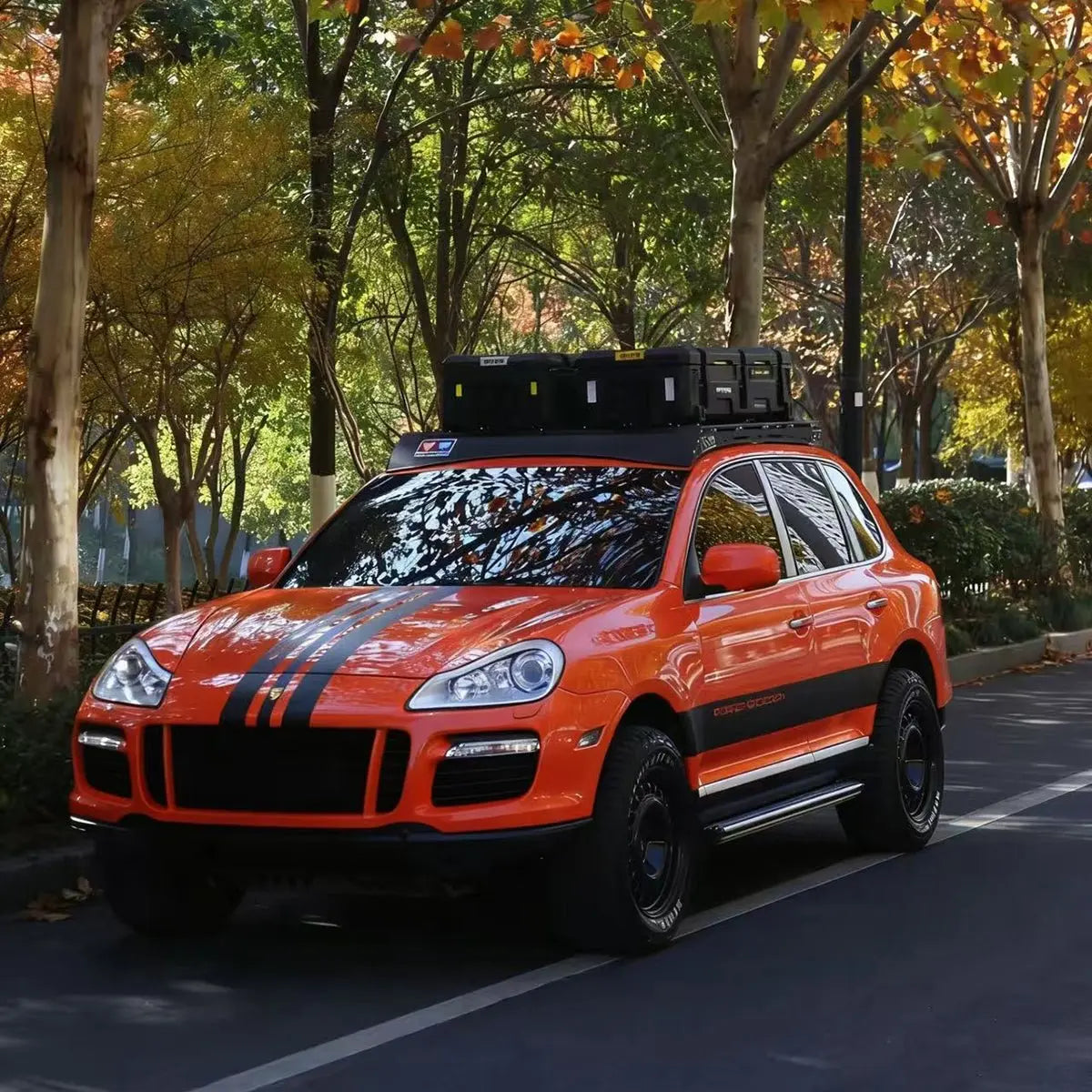 Porsche Cayenne 955/957 Gen 1 (2002–2010) modular roof rack – front three-quarter view on vehicle