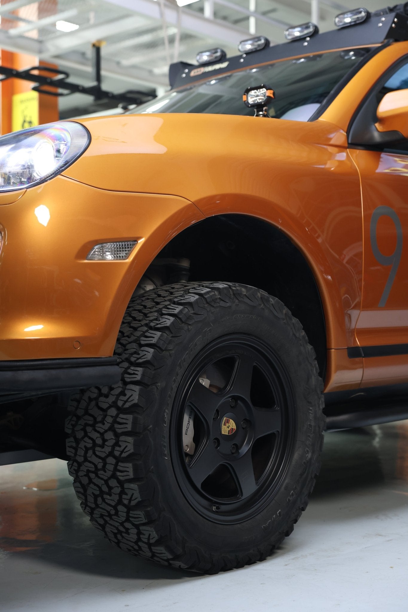 Porsche Cayenne 955/957 & VW Touareg 2-inch lift kit (2002–2010) — front suspension spacer installed detail